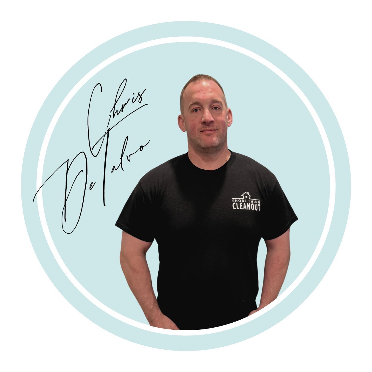 Man in black t-shirt, arms at his sides, inside a light blue circle.