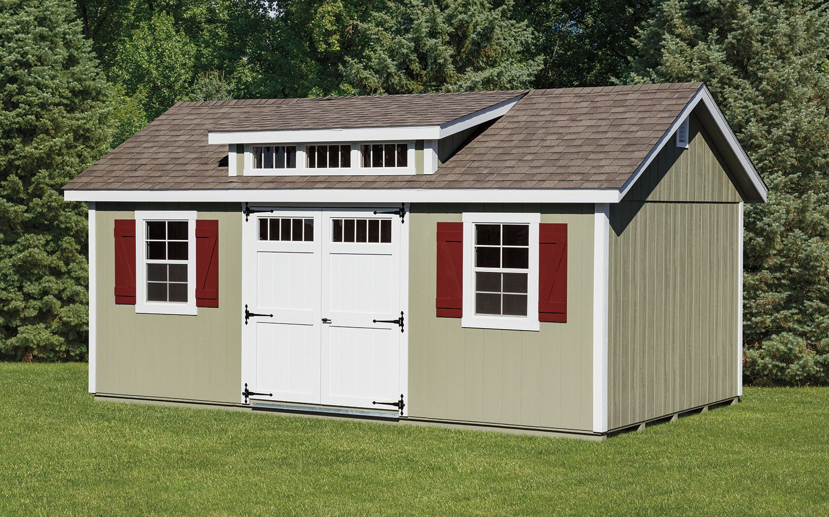 Tan shed with white doors, red shutters, and small upper window against green trees.