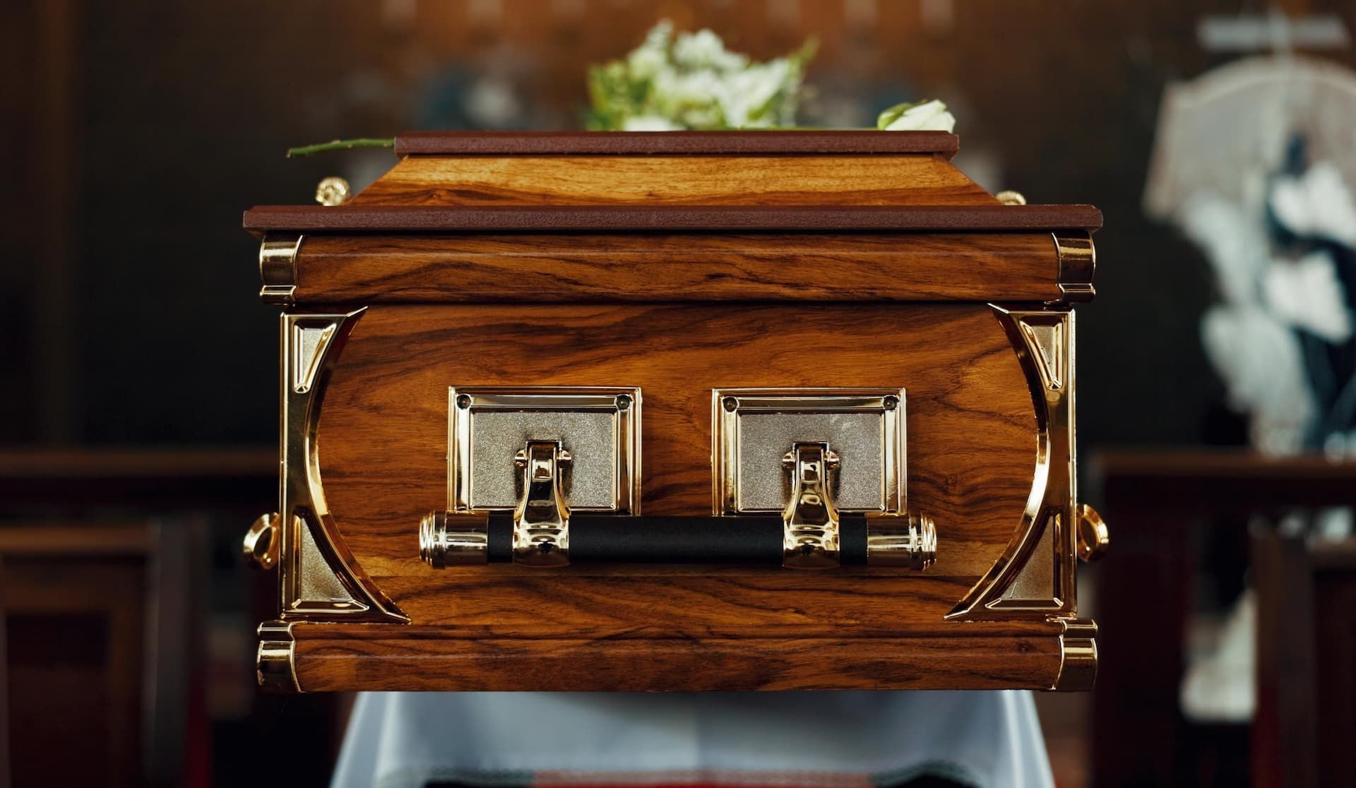 Casket with red roses