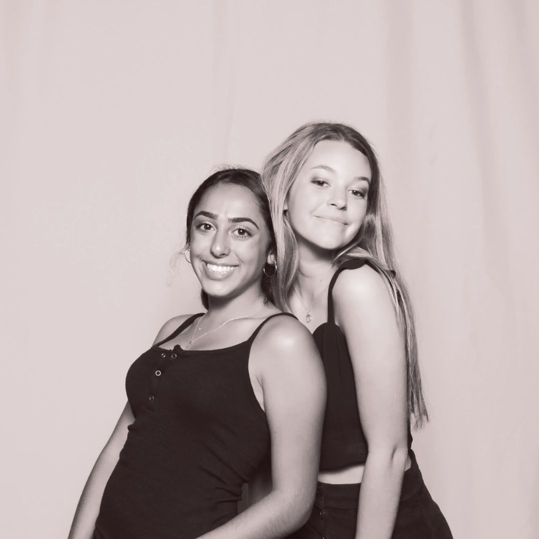 Glam Photo Booth guests attended a black attire only event with Ever After