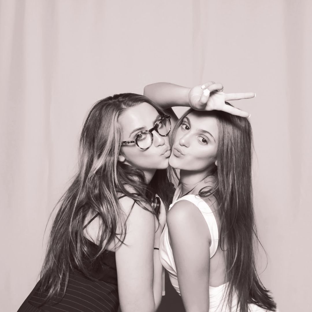 Two girls posing during their private party in the Ever After Glam Photo Booth in Detroit, Michigan