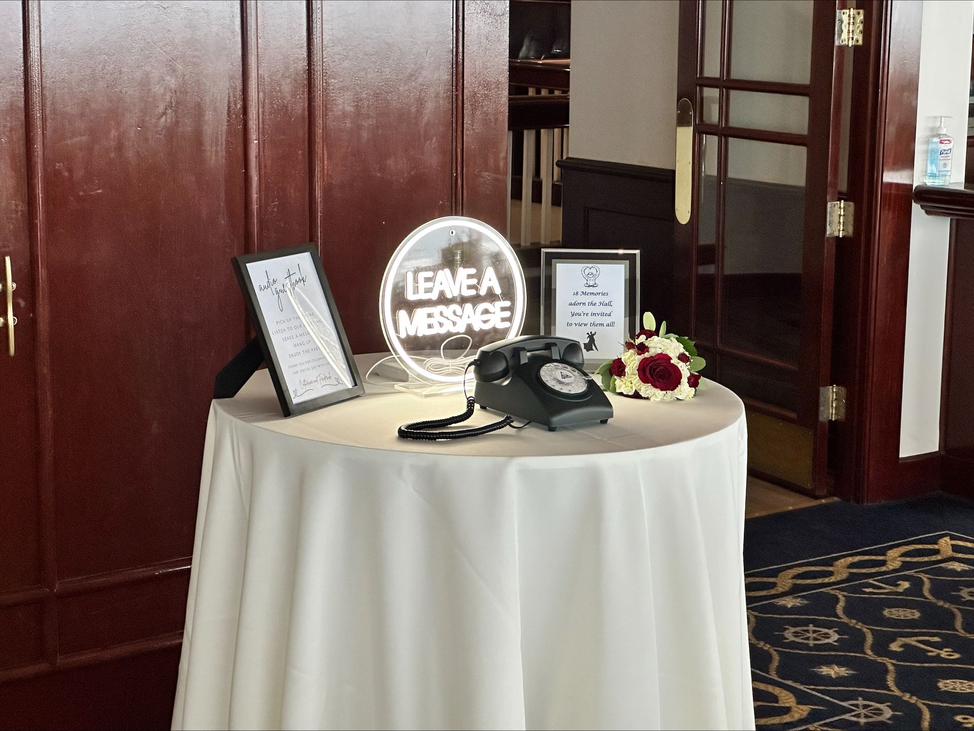 a table with a sign that says leave a message