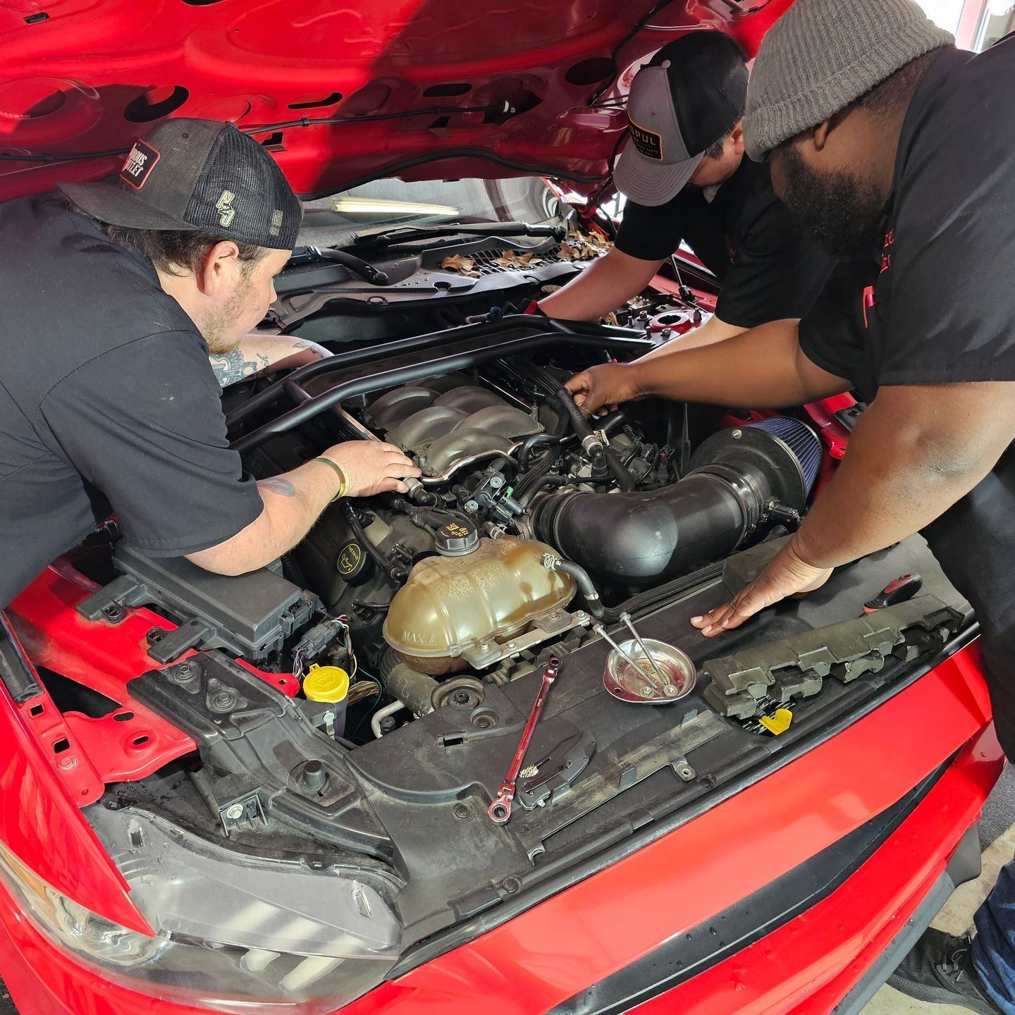 Technicians diagnosing electrical problem
