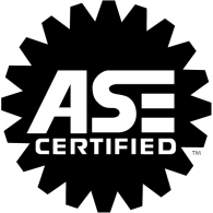 ASE Certified logo in black and white with a starburst shapeSilver and neon yellow sports car with oversized rear wing parked beside a white wall. | Pacific German