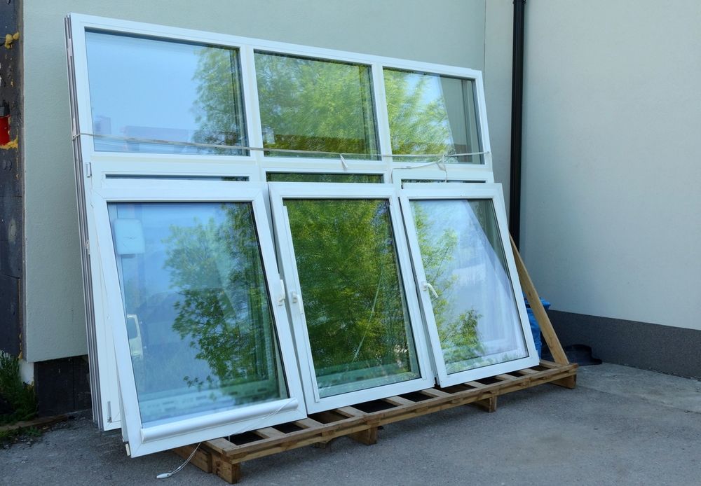 A Bunch of Windows Are Stacked on Top of Each — Maryborough Bay Glass & Aluminium in Maryborough, QLD