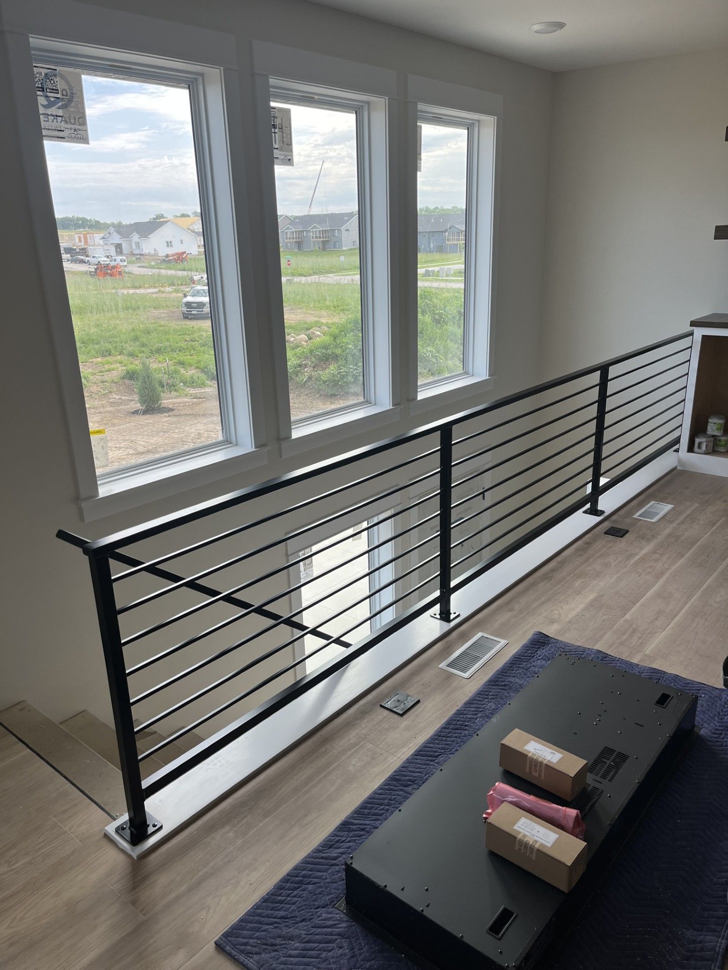 Custom Modern Interior Railings With Sleeved Wall Rail In North Liberty, IA