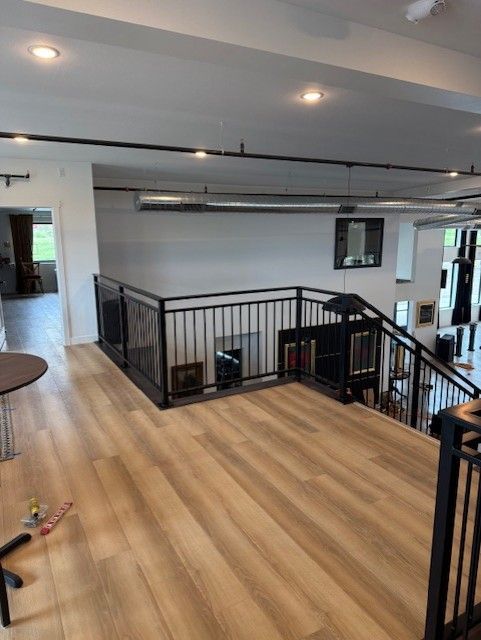 Custom Modern Interior Railing With Mid Rail Grip & Returns And Extensions In Cedar Falls, IA