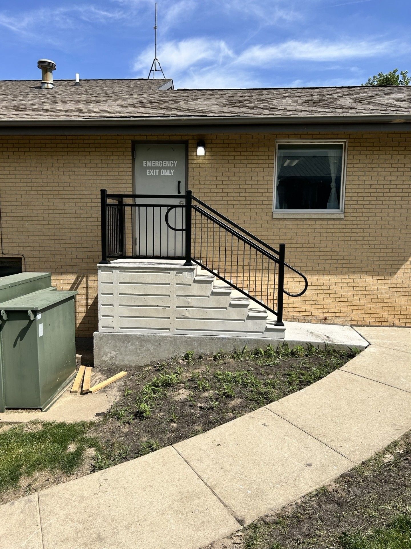 Aluminum Ultralox Railings With Mid Rail & Return Loops On New Precast Steps In Cedar Rapids, IA