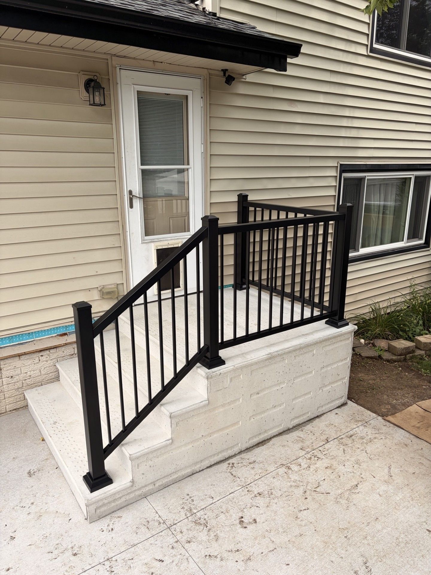 Aluminum Ultralox Railings On New Precast Steps In Cedar Rapids, IA