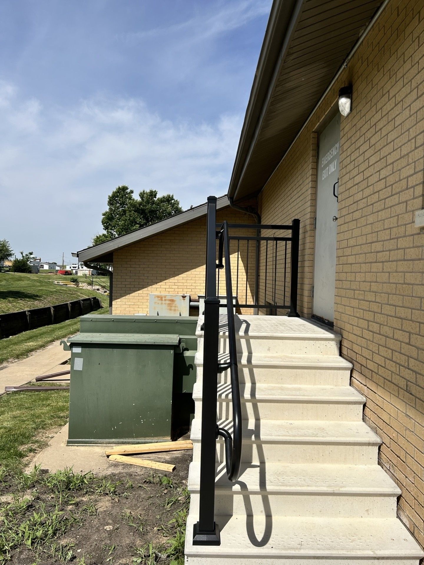 Aluminum Ultralox Railings With Mid Rail & Return Loops On New Precast Steps In Cedar Rapids, IA