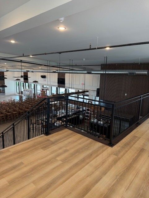 Custom Modern Interior Railing With Mid Rail Grip & Returns And Extensions In Cedar Falls, IA