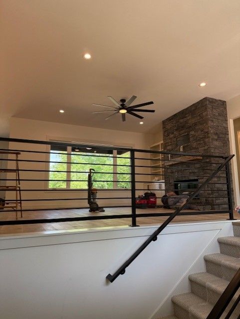 Custom Modern Interior Railings With Sleeved Wall Rail In Cedar Rapids, IA