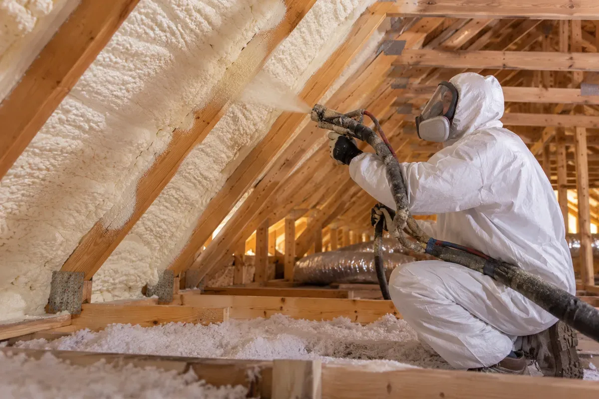 Spray foam insulation applied to attic roof rafters in Odessa, TX.