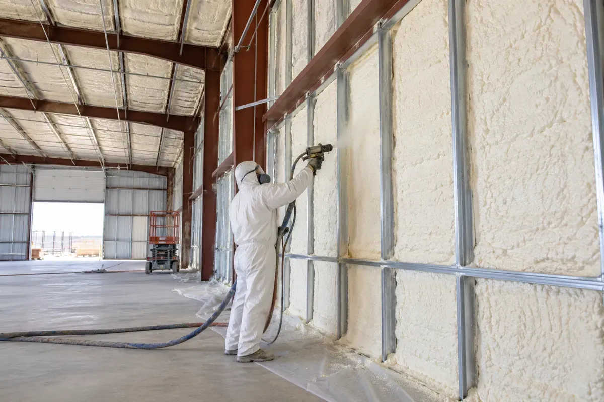 Commercial spray foam insulation applied to metal warehouse walls in Odessa, TX
