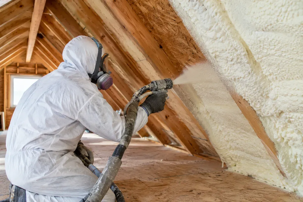 Spray foam insulation applied to attic roof rafters in Odessa, Texas