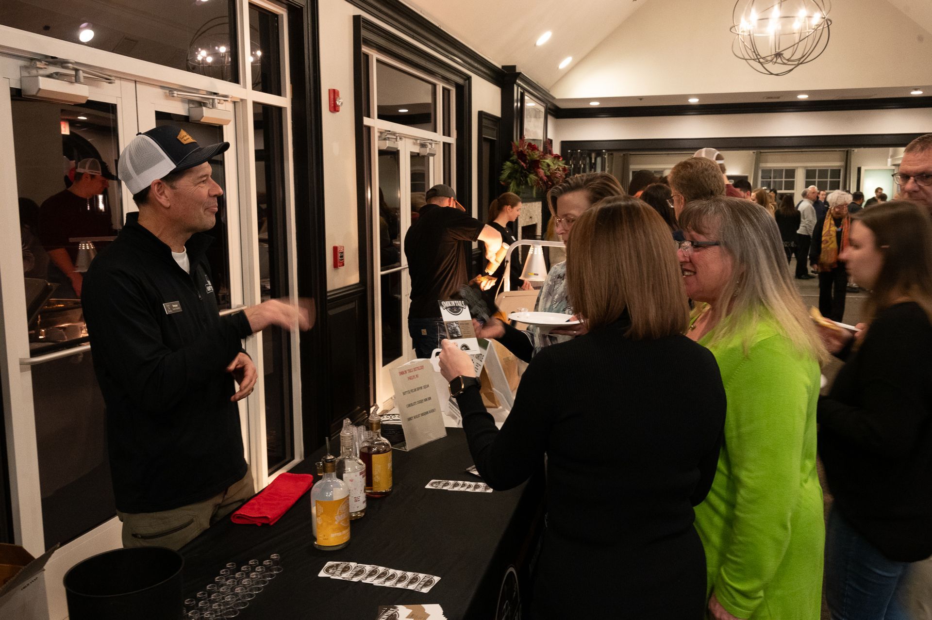 Guests with Vendors at Great Taste Event