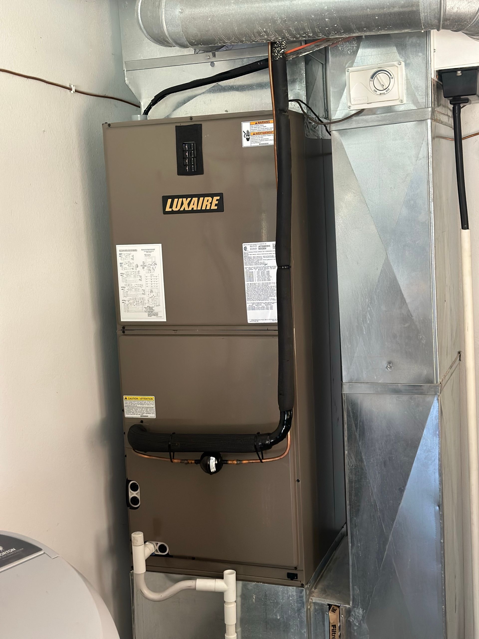 Water heater and a Furnace in the Room — Holts Summit, MO — JC HVAC & Sons LLC Water heater and a Furnace in the Room — Holts Summit, MO — JC HVAC & Sons LLC