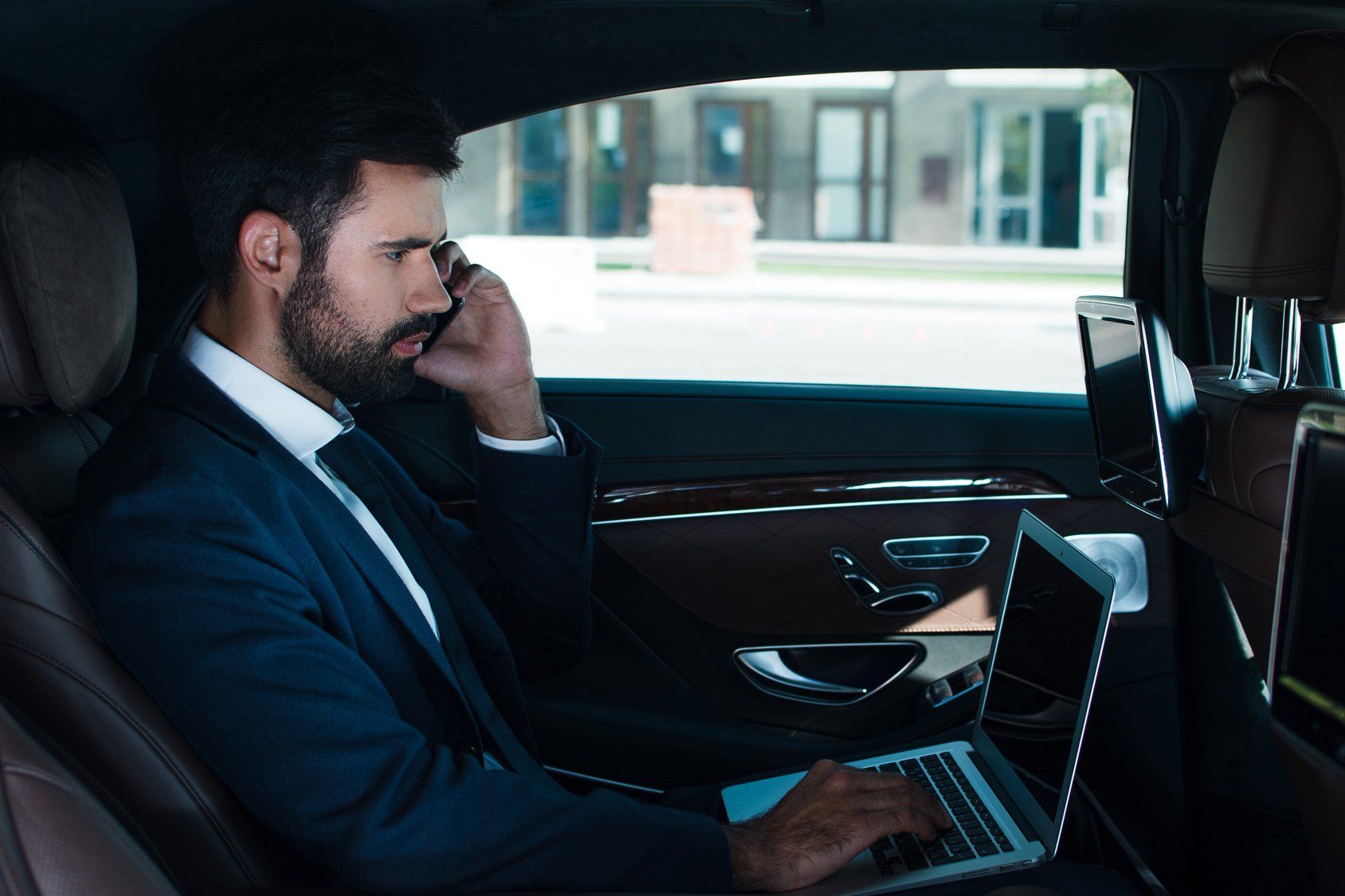 office goer travelling in taxi