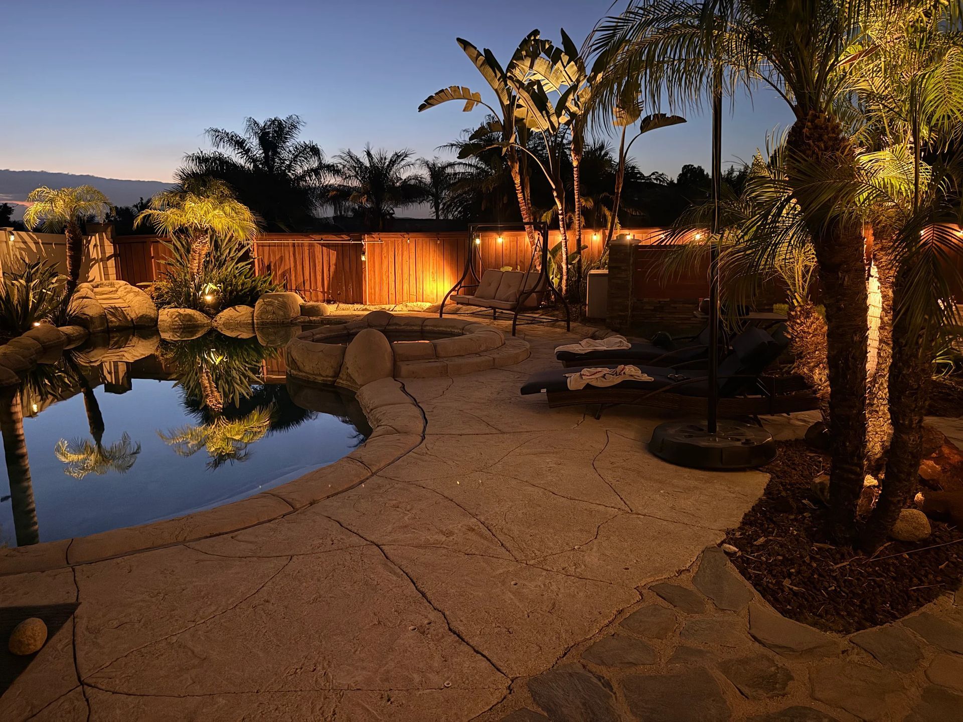 Elegant architectural lighting highlighting a luxury home by Be the Light Outdoor Lighting in Orange County, CA