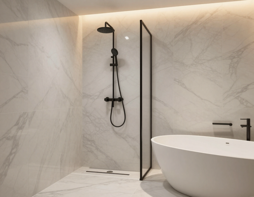 Marble-tiled walk-in shower with matte black fixtures and a freestanding soaking tub