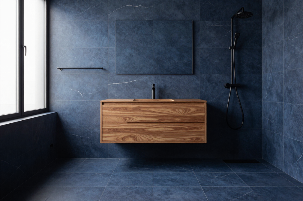 Luxury primary bathroom remodel with navy-veined tile and matte black fixtures