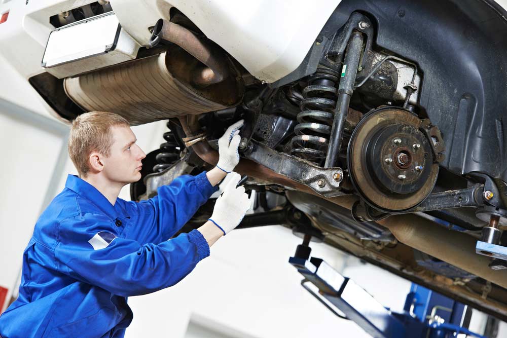 Mechanic Inspecting Suspension — Mechanic In Marulan, NSW