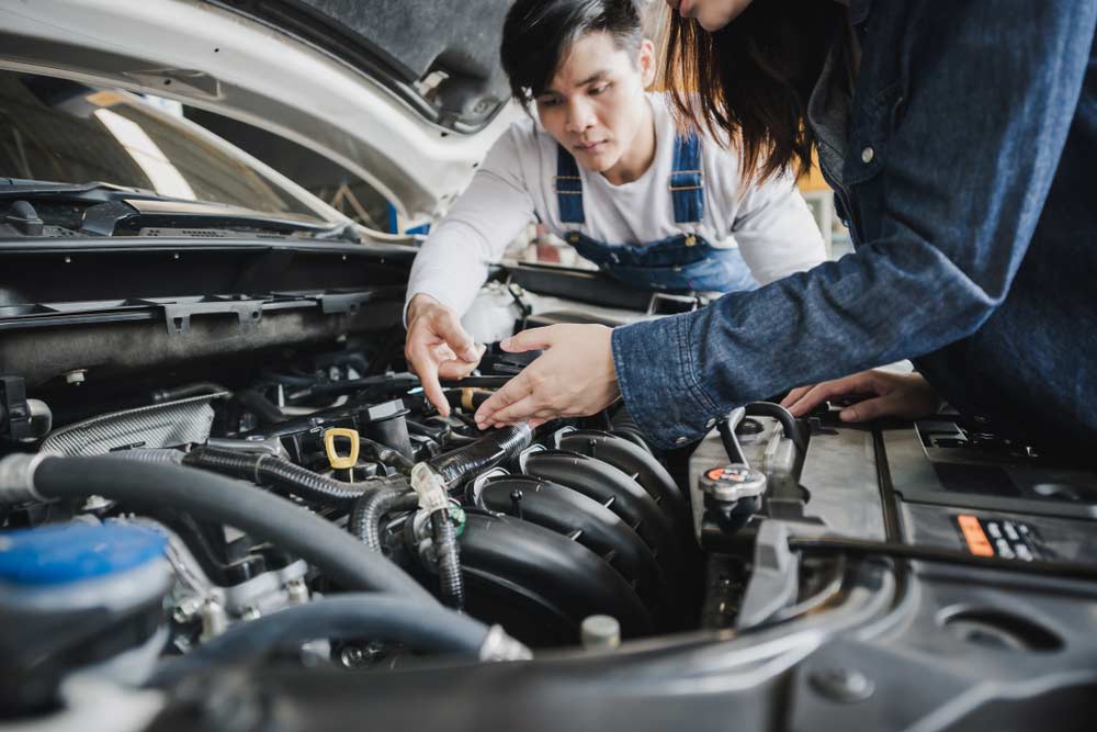Mechanic Talking To Female Customer — Mechanic In Marulan, NSW