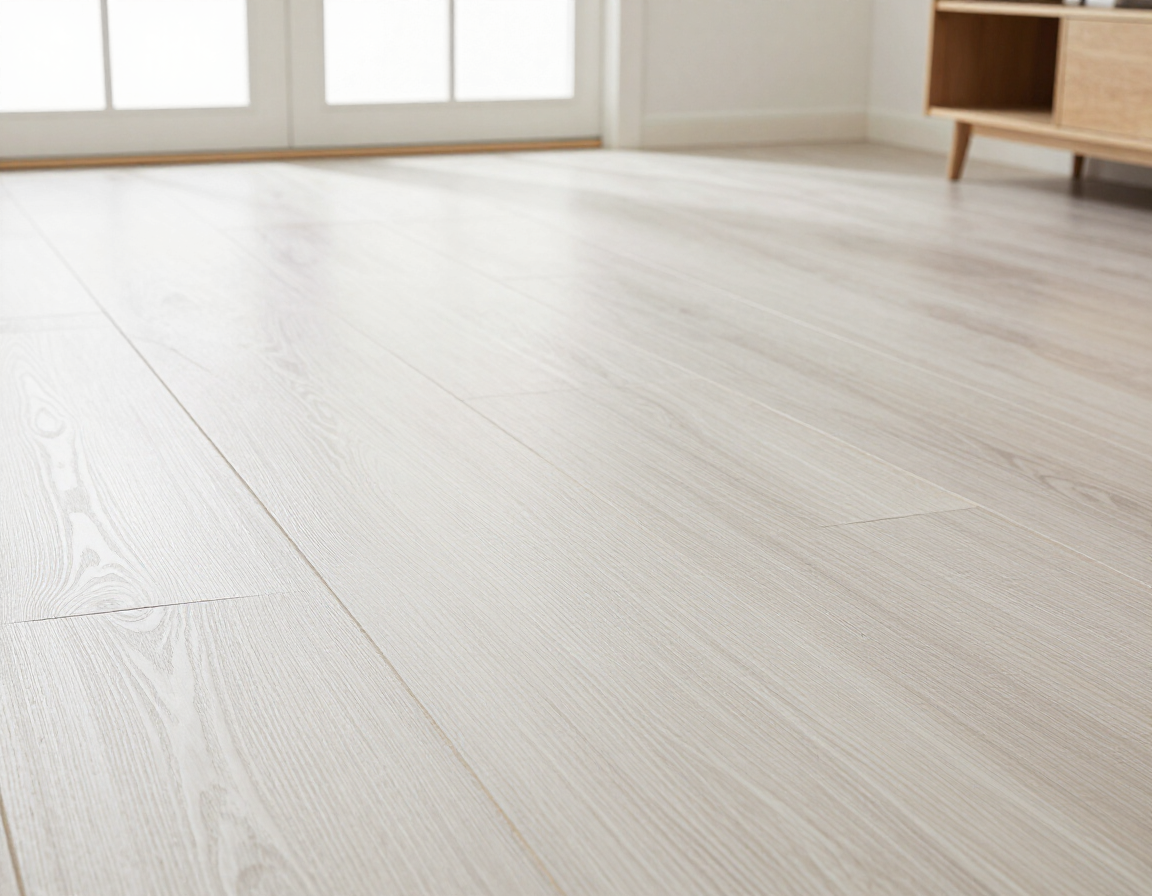 Wide-plank engineered white oak floor with cool-white stain in a bright living room
