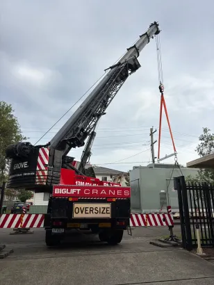 Biglift Cranes mobile crane handling heavy equipment during industrial crane hire services in Sydney