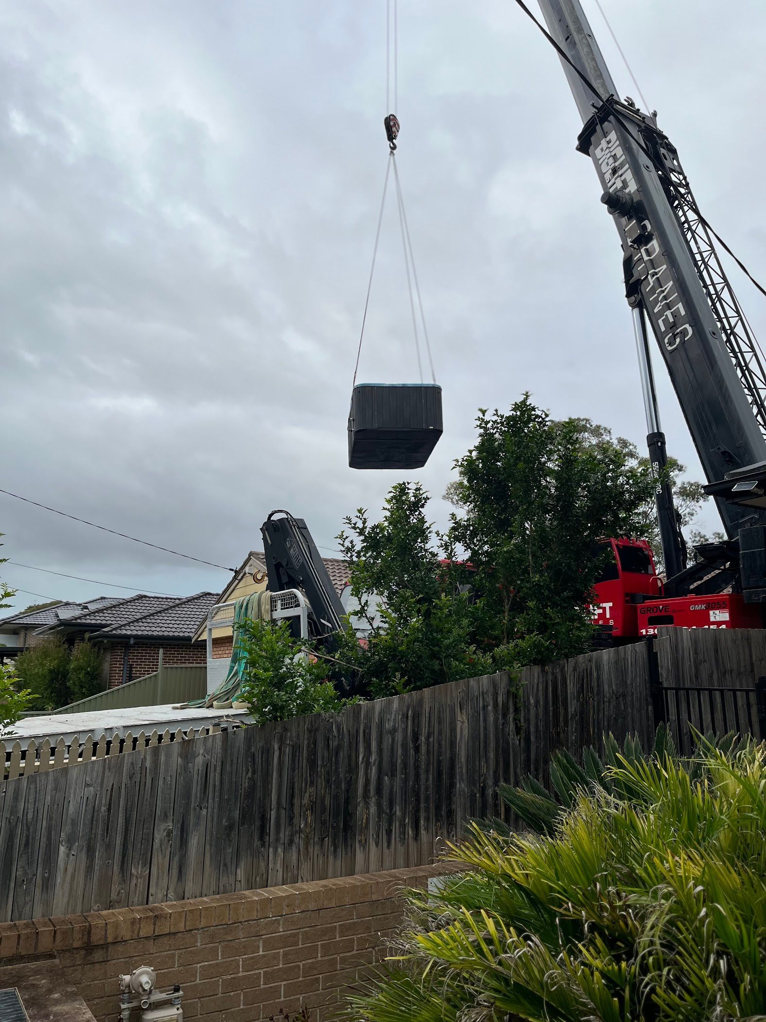 BigLift Cranes mobile crane lifting a pool shell in Sydney