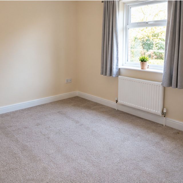 The same room after the furniture has been carried out