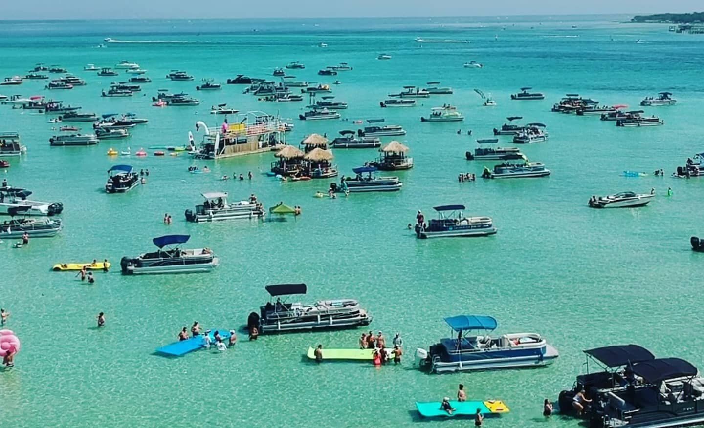 Top view of Crab Island with full of boats