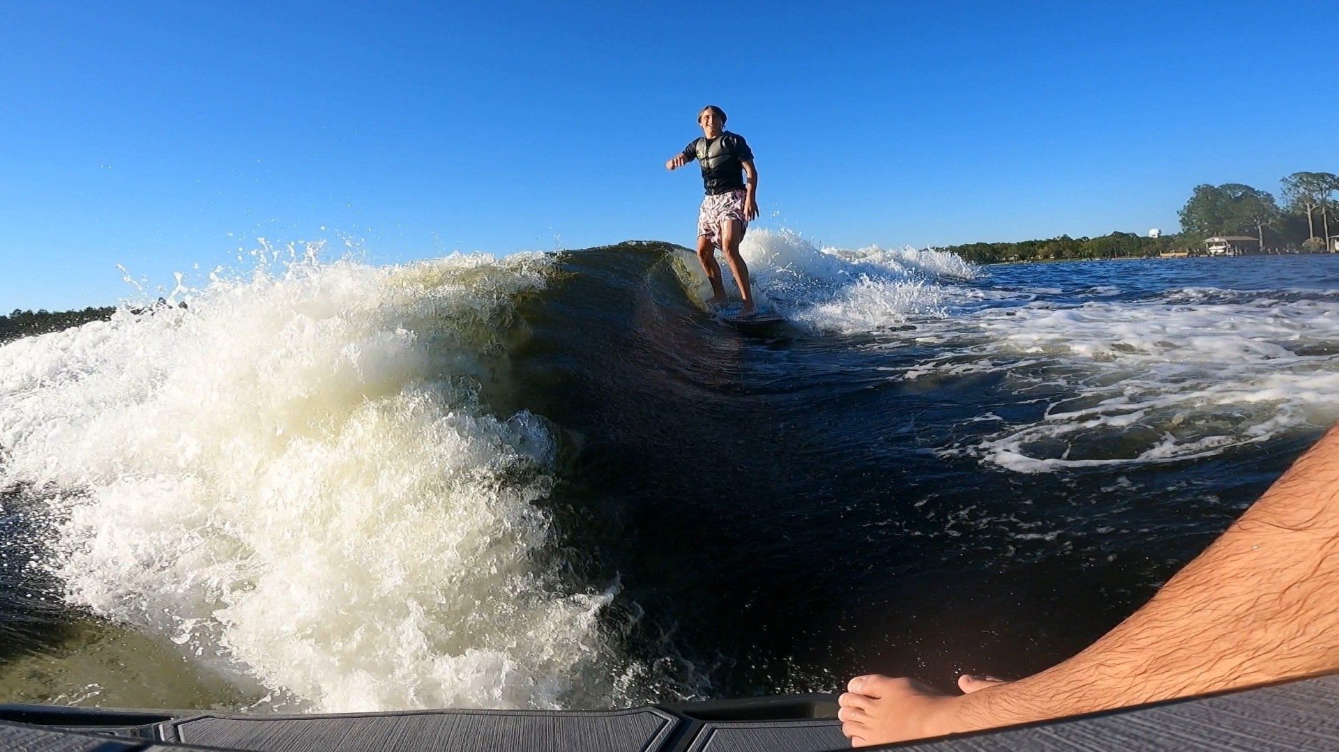Far view of a guy surfing