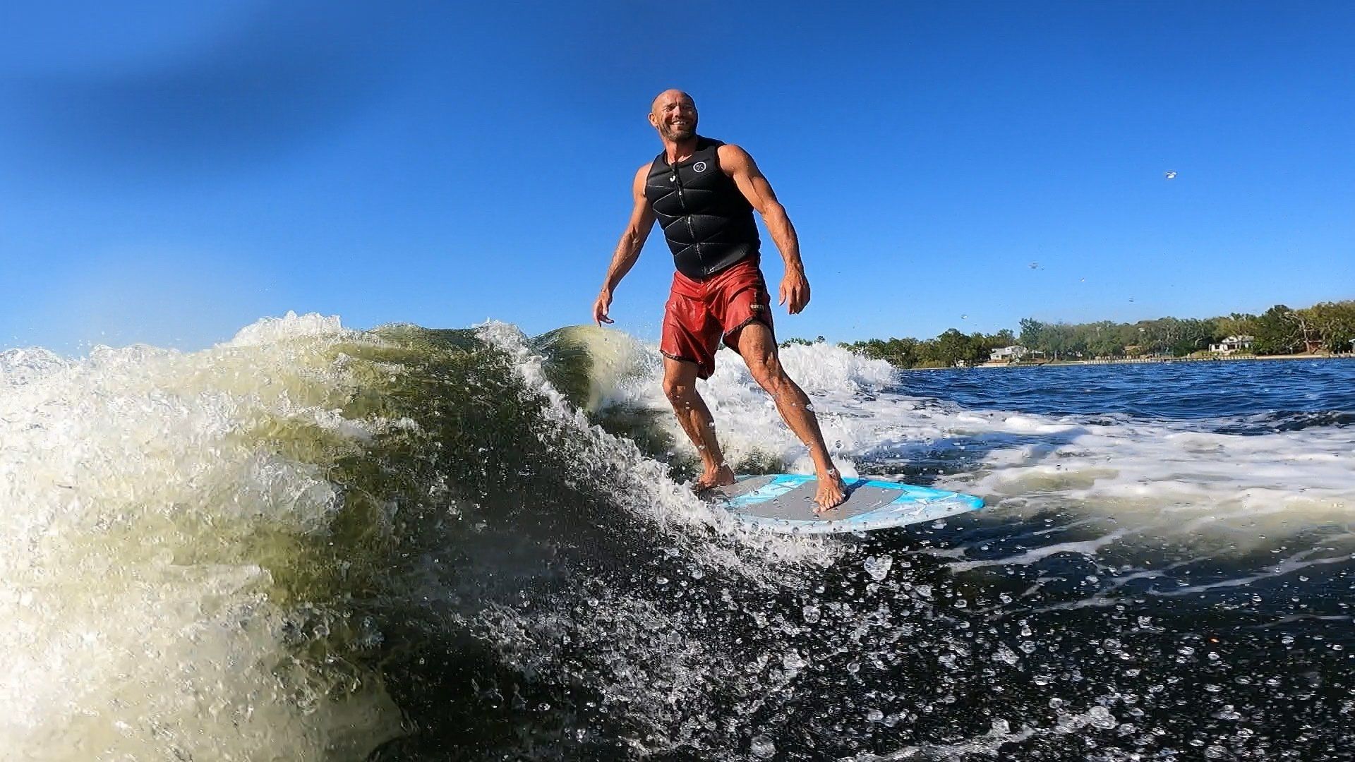 Near view of a guy surfing