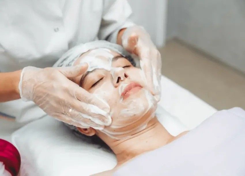 Facial Treatment With Gloved Hands — A9 Skin and Hair Clinic In Westmead, NSW