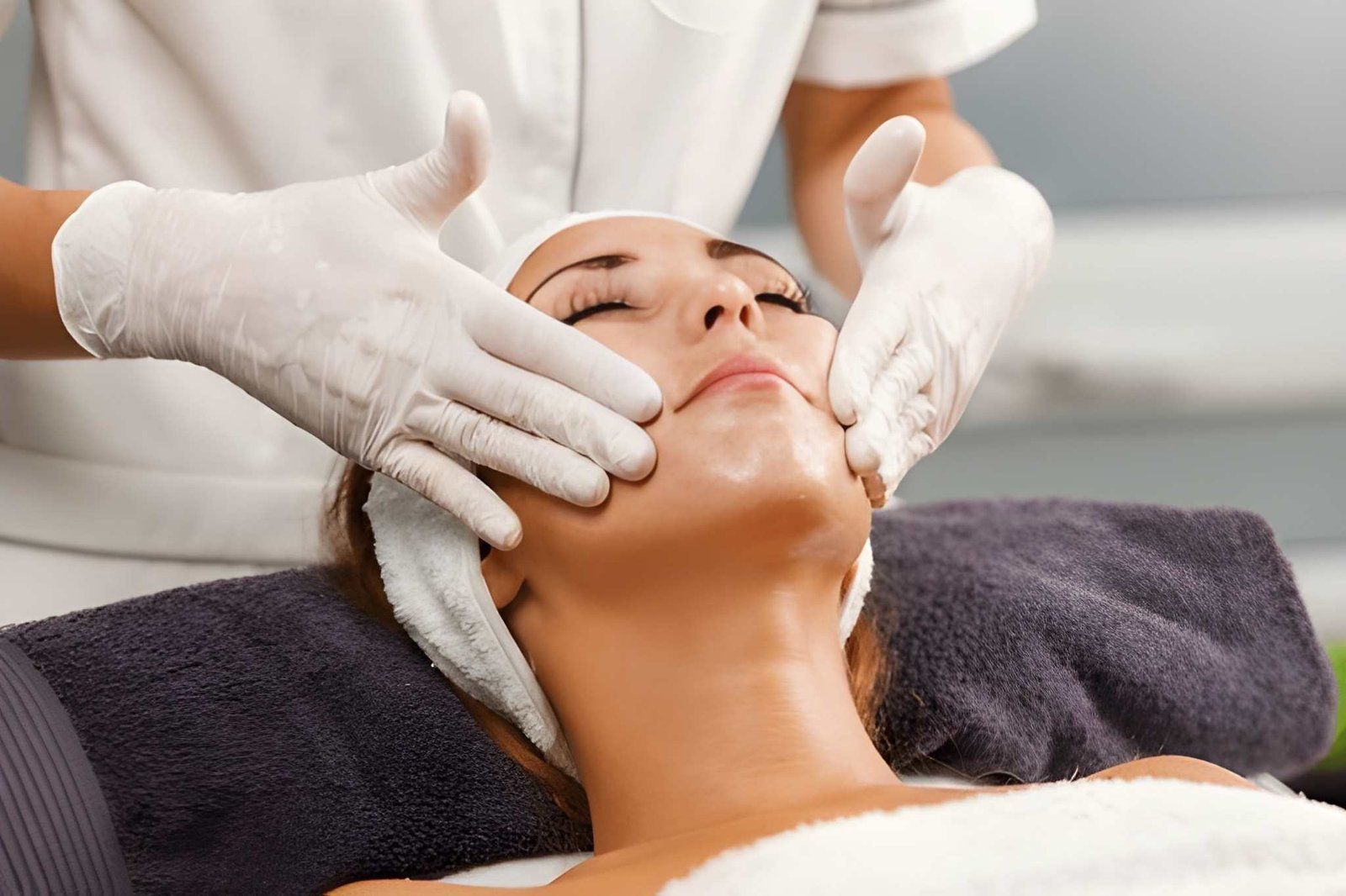 Gloved Hands Giving a Facial Massage — A9 Skin and Hair Clinic In Westmead, NSW