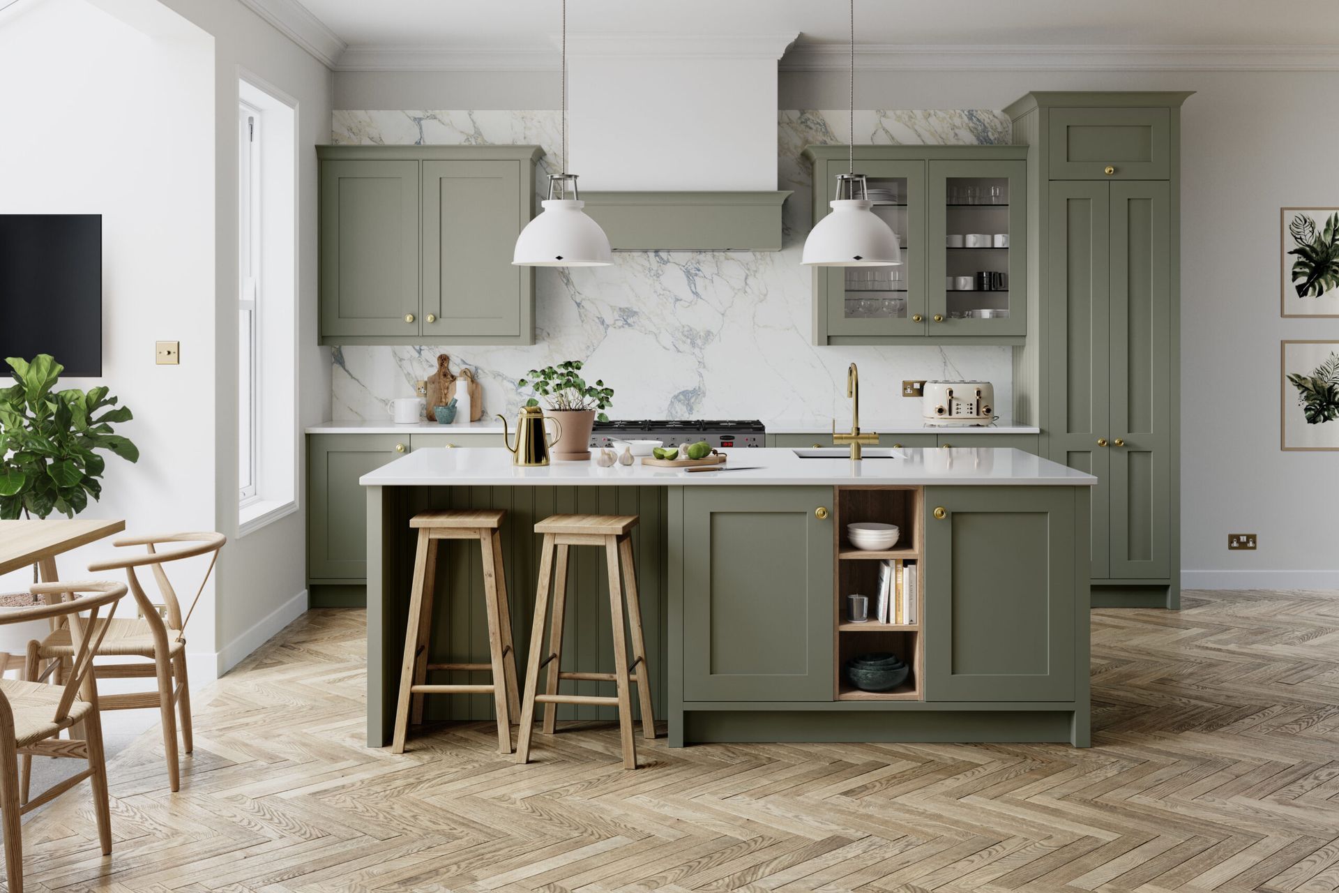 Olive green kitchen with marble backsplash, island with stools, and wooden floor.