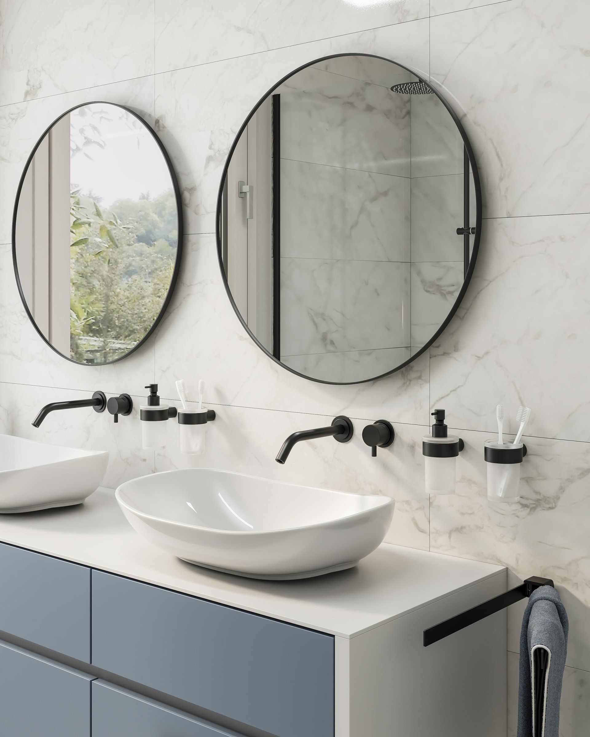Modern bathroom with two circular mirrors, white sinks, blue cabinets, and black fixtures.