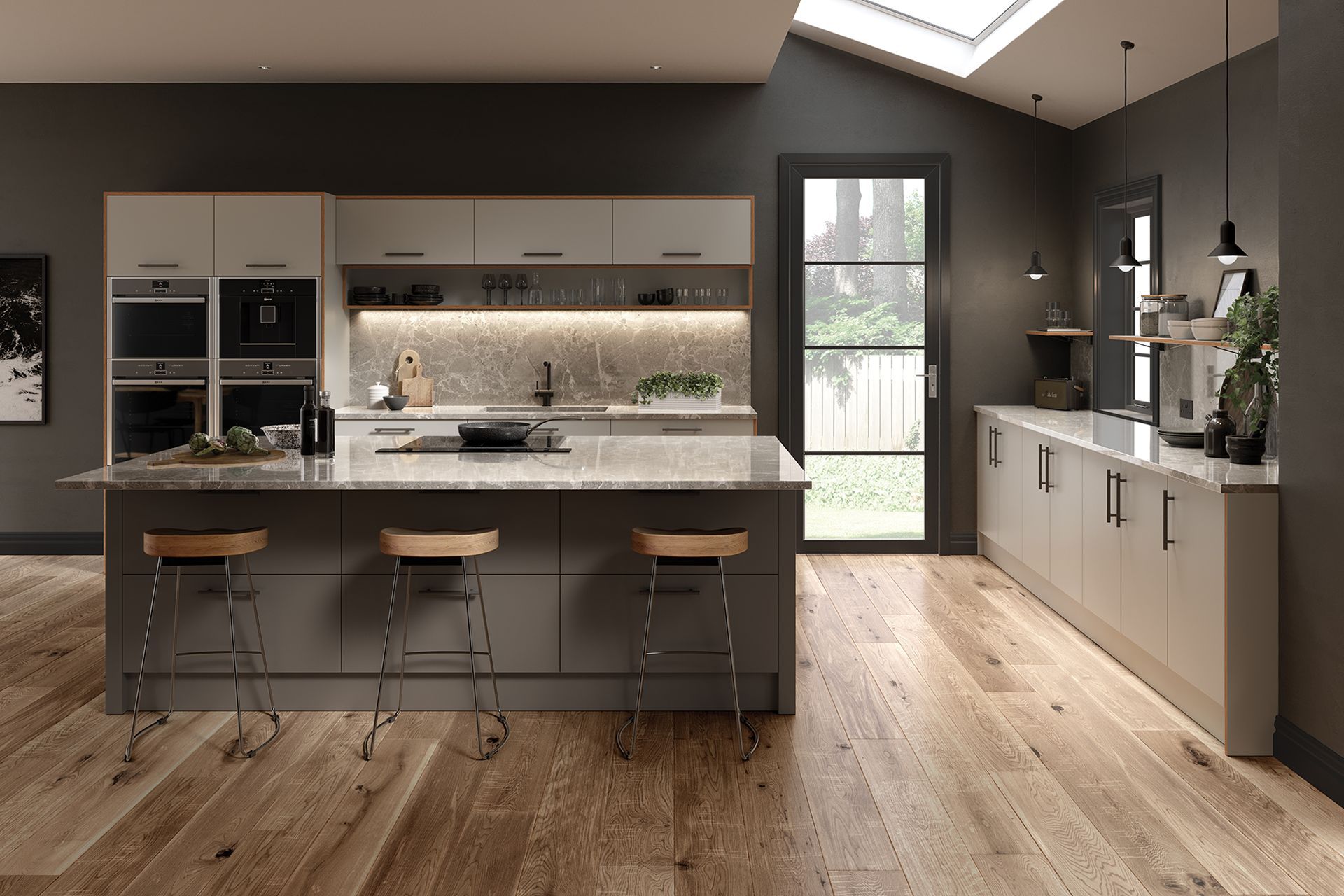 Modern kitchen with island, wooden floors, grey cabinets, and skylight. Kitchen fitter in Bristol