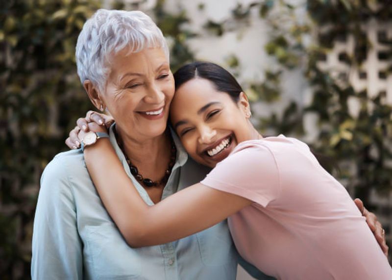 Daughter Hugging Her Mother — Hillsboro, TX — Lehmann Insurance Agency Daughter Hugging Her Mother — Hillsboro, TX — Lehmann Insurance Agency
