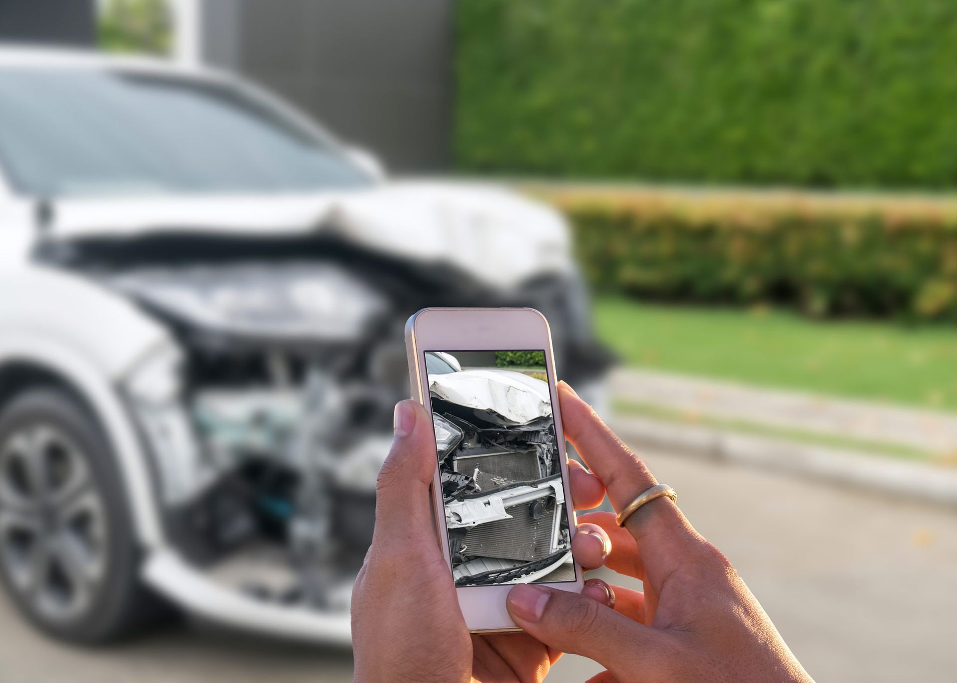 Taking Picture Of Damage Car — Hillsboro, TX — Lehmann Insurance Agency Taking Picture Of Damage Car — Hillsboro, TX — Lehmann Insurance Agency