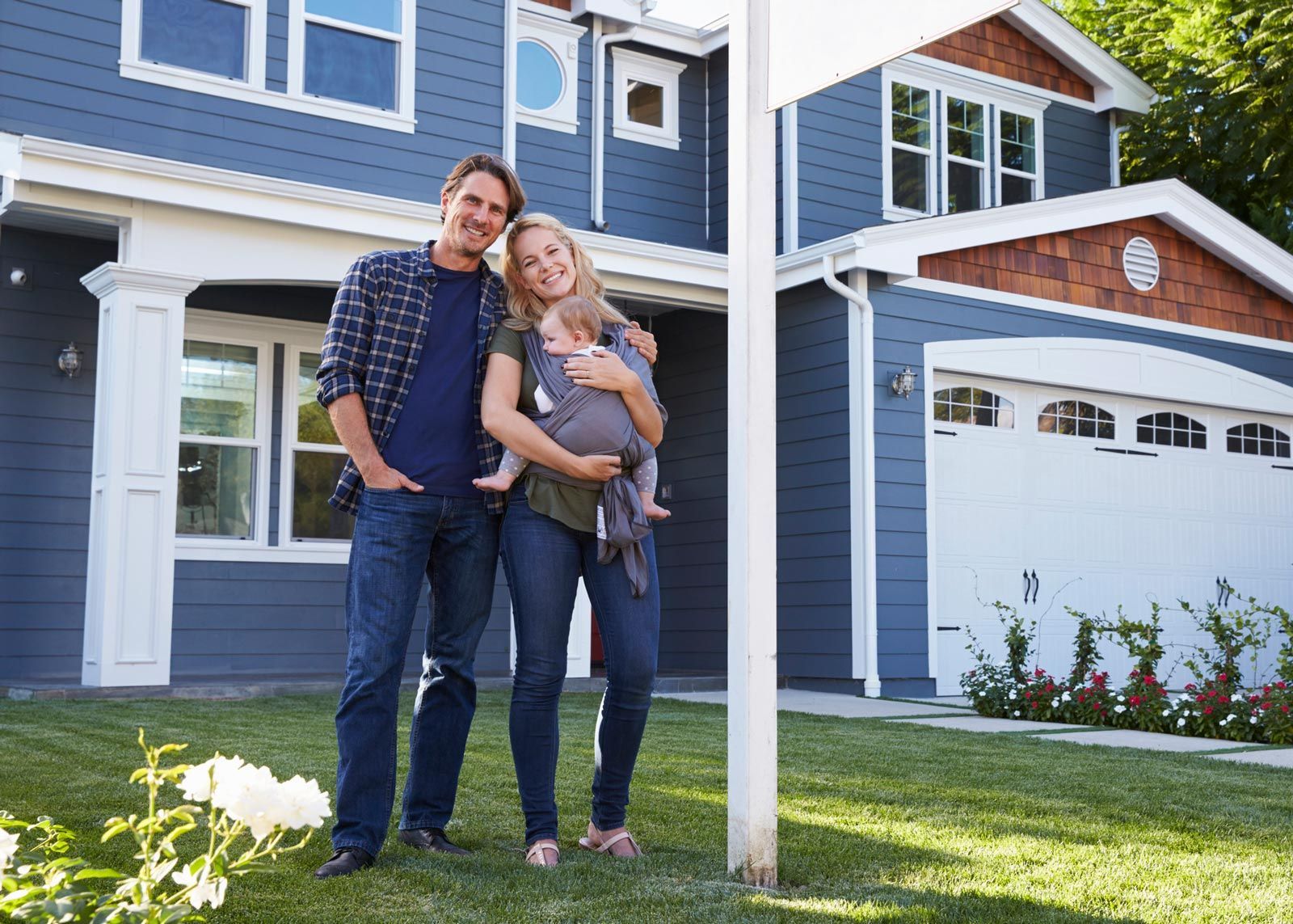 Family Standing Outside House — Hillsboro, TX — Lehmann Insurance Agency Family Standing Outside House — Hillsboro, TX — Lehmann Insurance Agency