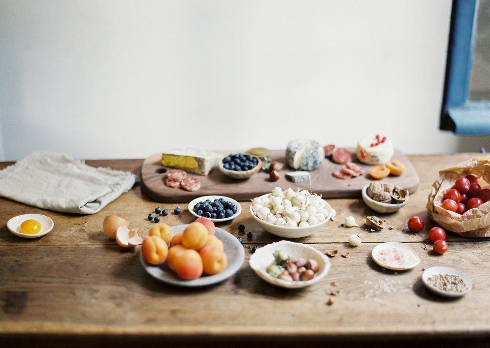 There are many different types of food on the table.