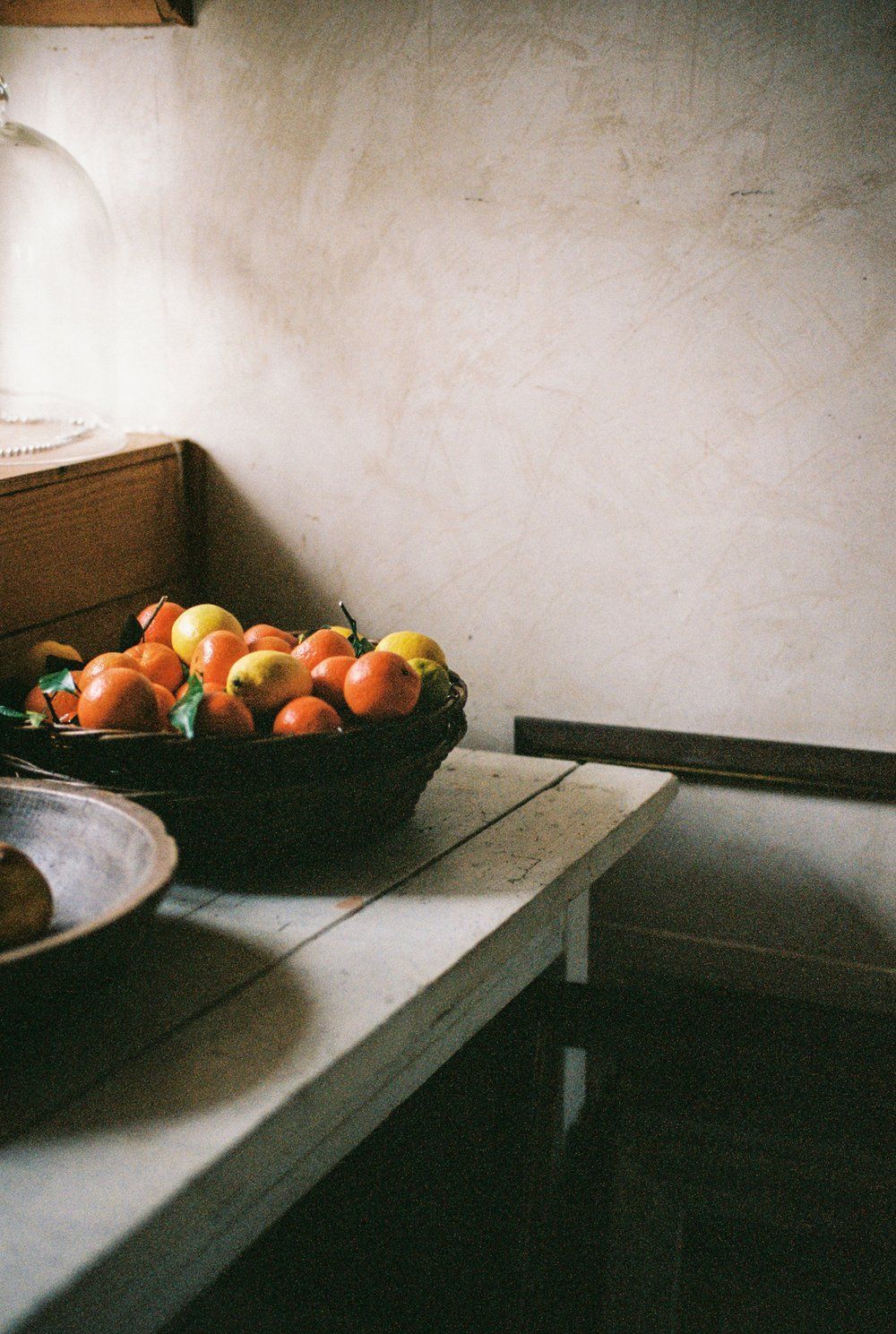 A bowl of fruit is sitting on a table.