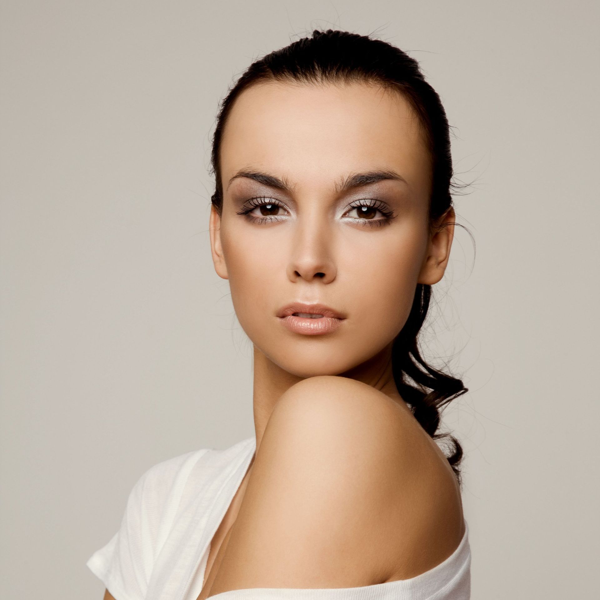 a close up of a woman 's face with a white shirt on at ERA Wellness Spa in Georgetown, KY