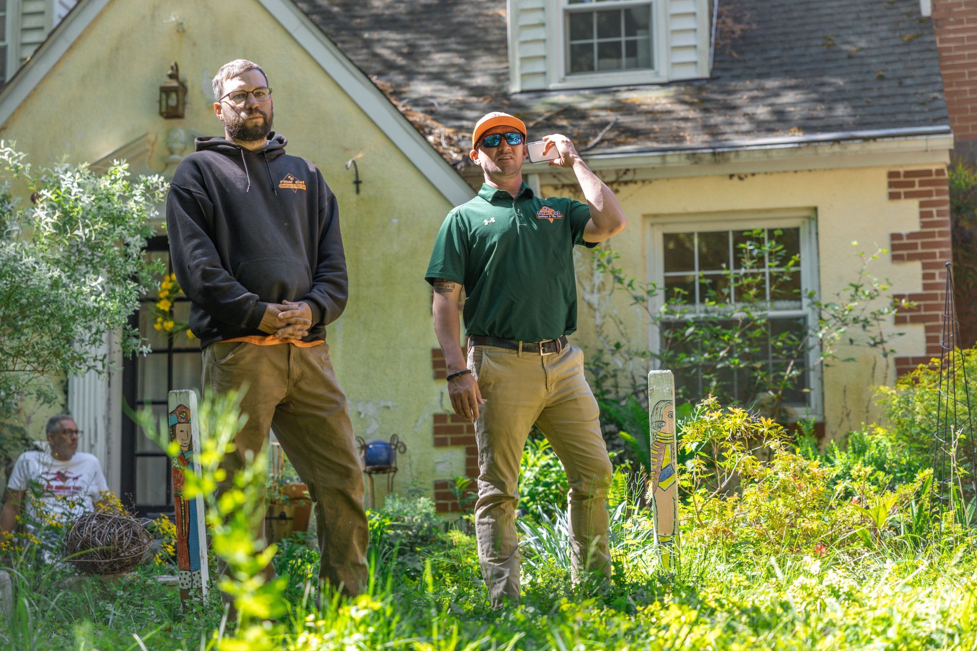 Final Cut Landscape & Tree Care team meeting with a homeowner during a residential tree service consultation in Maryland