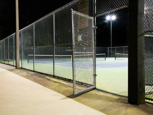 Tennis Court Entrance At Night - Lancaster, CA - Sav-On Fence Co.