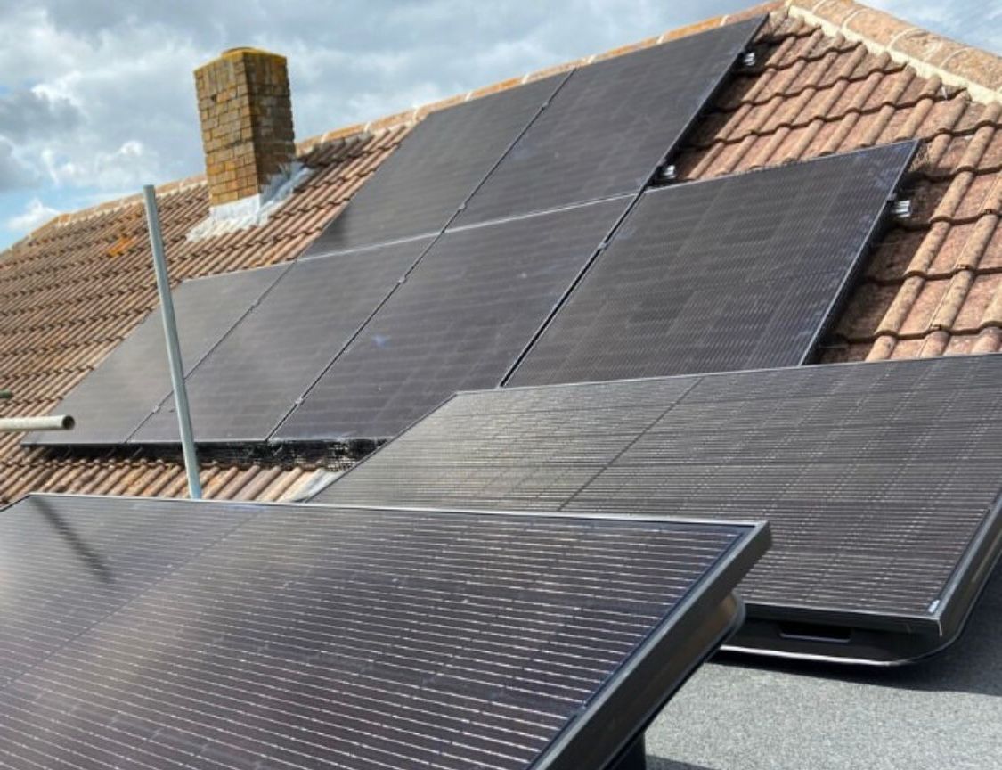 A roof with a lot of solar panels on it