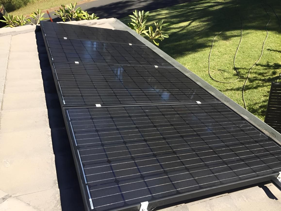 Row of Solar Panels Getting Clean — Hastings Services in Laurieton, NSW