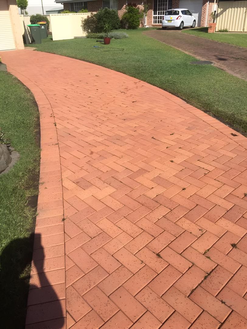 Brick Floor Getting Cleaned by Pressure Water — Hastings Services in Bonny Hills, NSW